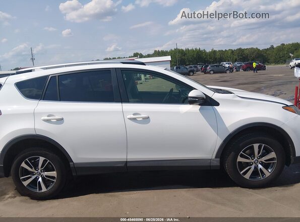 JTMWFREV0JJ165446 2018 TOYOTA RAV4 White Вид задньої частини салону