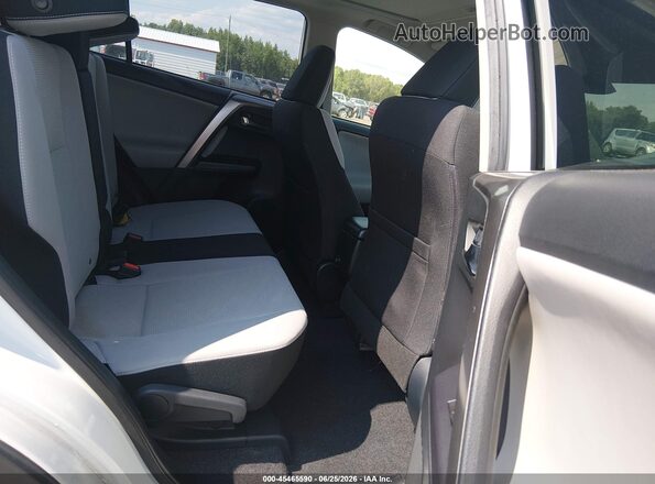 JTMWFREV0JJ165446 2018 TOYOTA RAV4 White Вид наклейки з VIN-кодом