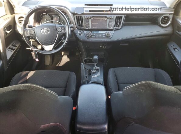 JTMWFREV0JJ197376 2018 TOYOTA RAV4 White Dashboard view