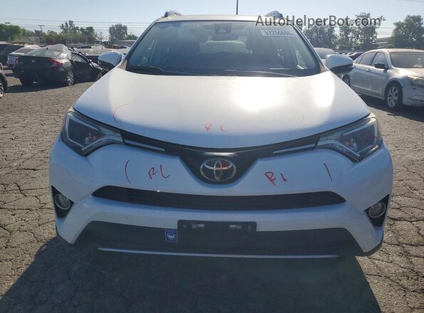 JTMWFREV0JJ197376 2018 TOYOTA RAV4 White Front view