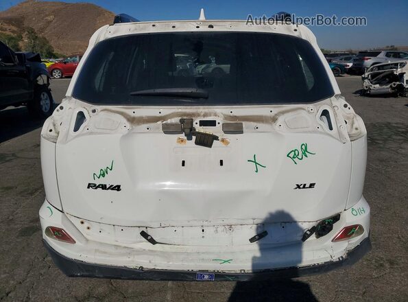 JTMWFREV0JJ197376 2018 TOYOTA RAV4 White Rear view