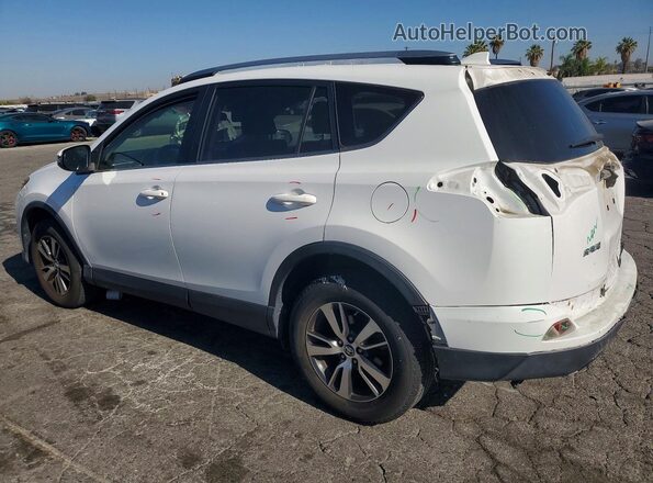 JTMWFREV0JJ197376 2018 TOYOTA RAV4 White Rear left