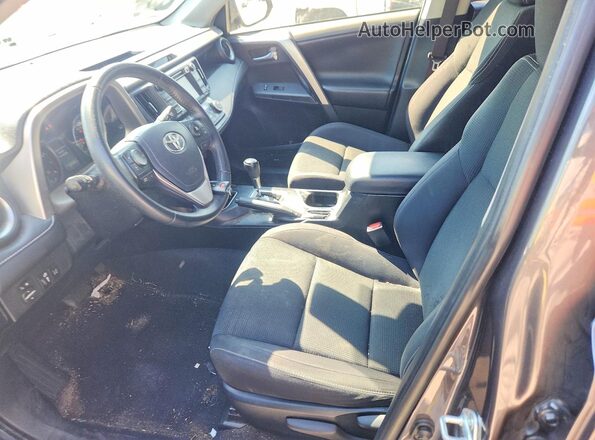 JTMWFREV1JJ736555 2018 TOYOTA RAV4 Gray Front interior view