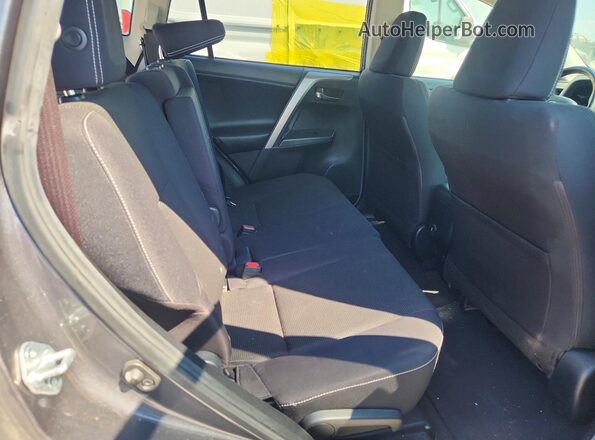 JTMWFREV1JJ736555 2018 TOYOTA RAV4 Gray Rear interior view
