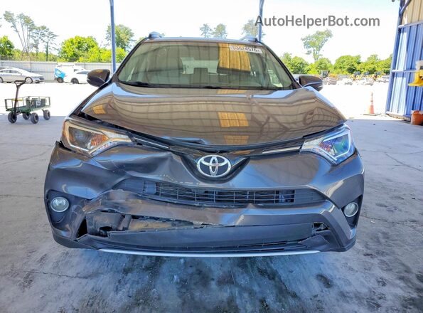 JTMWFREV2GJ094520 2016 TOYOTA RAV4 Gray წინა ხედი