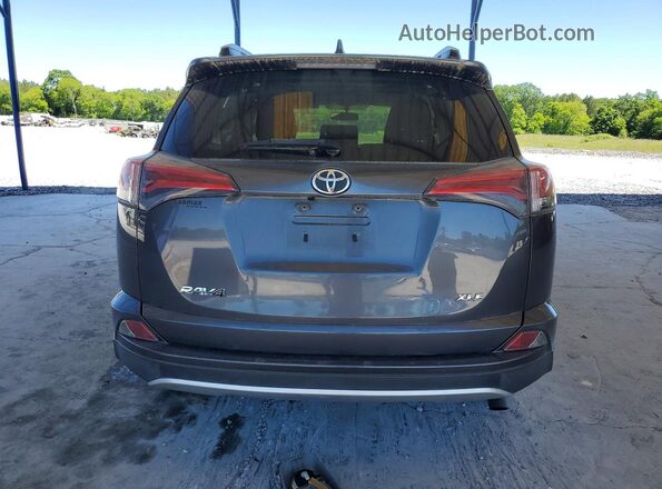 JTMWFREV2GJ094520 2016 TOYOTA RAV4 Gray უკანა ხედი