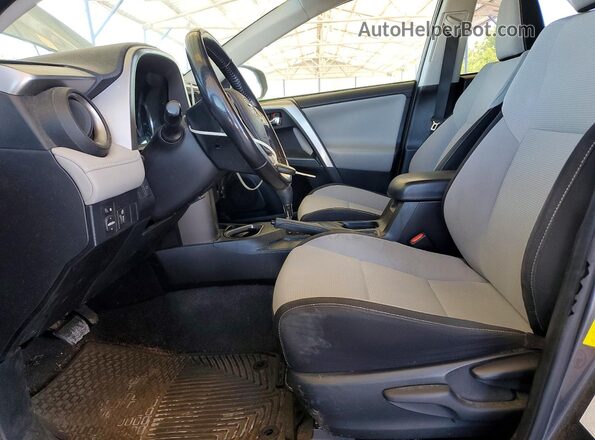 JTMWFREV2GJ094520 2016 TOYOTA RAV4 Gray წინა სალონის ხედი