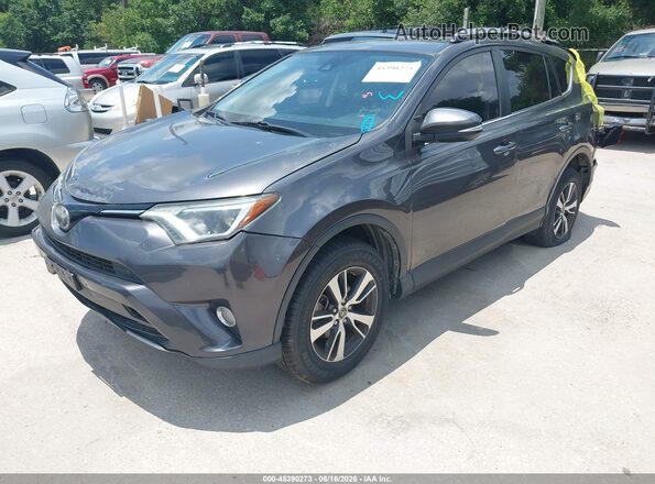 JTMWFREV2JJ740923 2018 TOYOTA RAV4 Gray Vista tres cuartos delantera izquierda