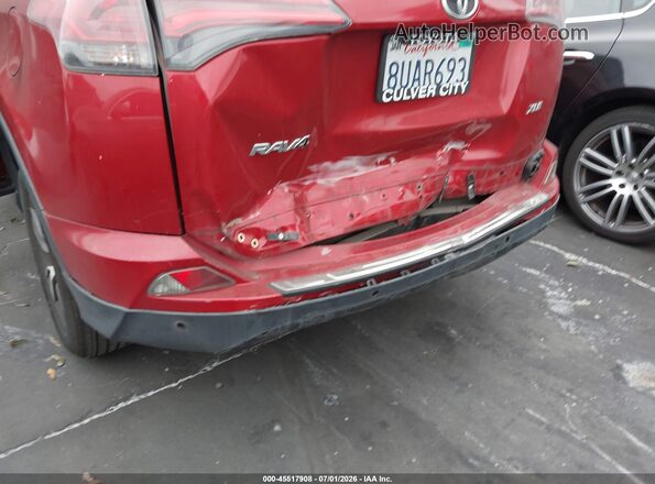 JTMWFREV3HJ118602 2017 TOYOTA RAV4 Red Vista frontal