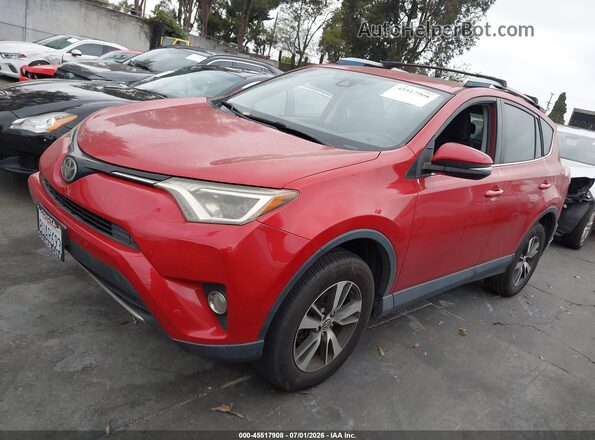 JTMWFREV3HJ118602 2017 TOYOTA RAV4 Red Vista tres cuartos delantera izquierda