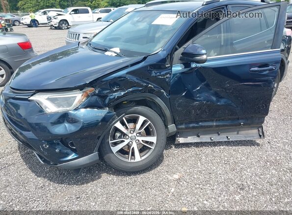 JTMWFREV3JJ165618 2018 TOYOTA RAV4 Blue Front view