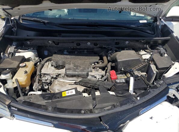 JTMWFREV3JJ735617 2018 TOYOTA RAV4 White Widok wnętrza z tyłu