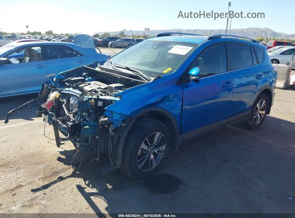 JTMWFREV4HD097144 2017 TOYOTA RAV4 Blue Przód lewy