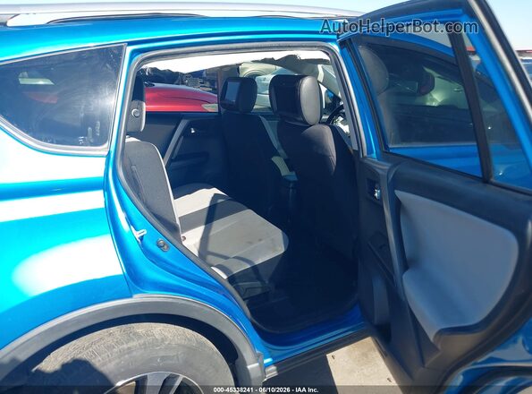 JTMWFREV4HD097144 2017 TOYOTA RAV4 Blue Widok naklejki z numerem VIN