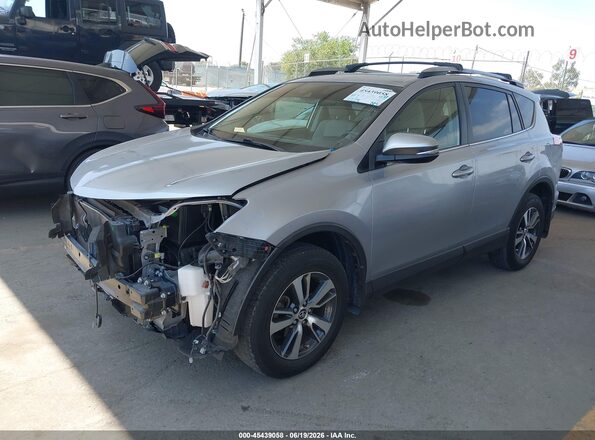 JTMWFREV4JD130584 2018 TOYOTA RAV4 Silver Vista tres cuartos delantera izquierda