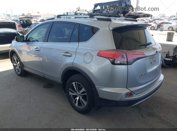 JTMWFREV4JD130584 2018 TOYOTA RAV4 Silver Trasero izquierdo