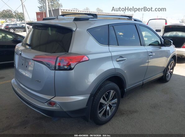JTMWFREV4JD130584 2018 TOYOTA RAV4 Silver Trasero derecho