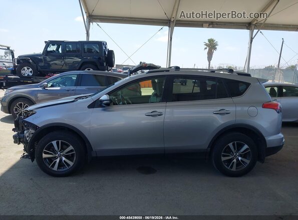 JTMWFREV4JD130584 2018 TOYOTA RAV4 Silver 