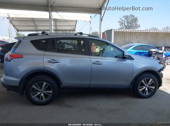 JTMWFREV4JD130584 2018 TOYOTA RAV4 Silver Vista interior de 360 grados