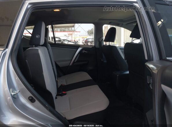 JTMWFREV4JD130584 2018 TOYOTA RAV4 Silver Vista de la etiqueta del VIN