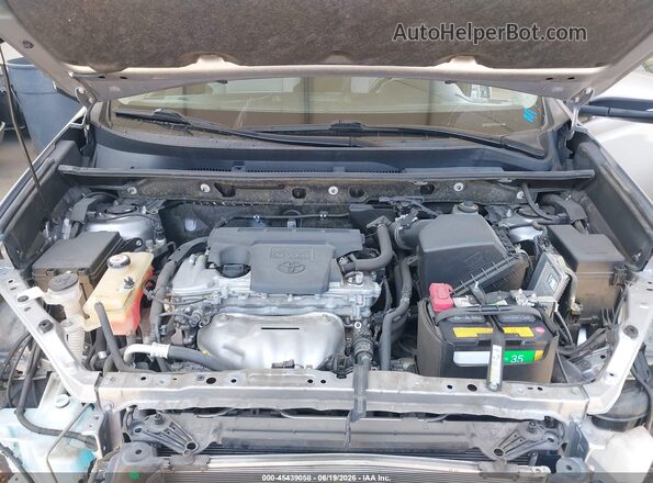 JTMWFREV4JD130584 2018 TOYOTA RAV4 Silver Vista trasera