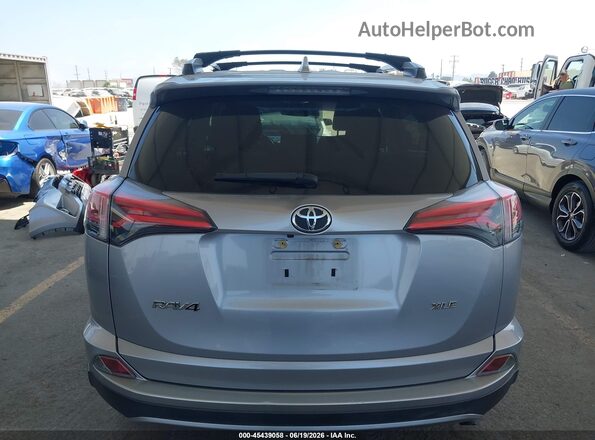 JTMWFREV4JD130584 2018 TOYOTA RAV4 Silver 