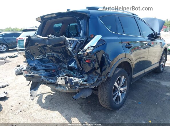 JTMWFREV4JJ172528 2018 TOYOTA RAV4 Blue Front view