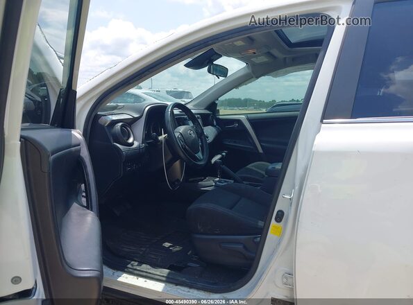 JTMWFREV4JJ201493 2018 TOYOTA RAV4 White Front interior view