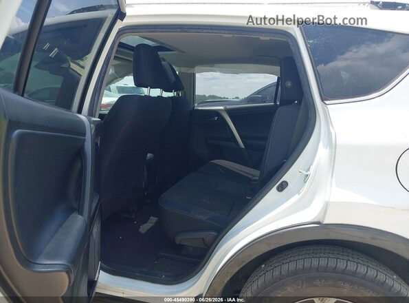 JTMWFREV4JJ201493 2018 TOYOTA RAV4 White VIN sticker view