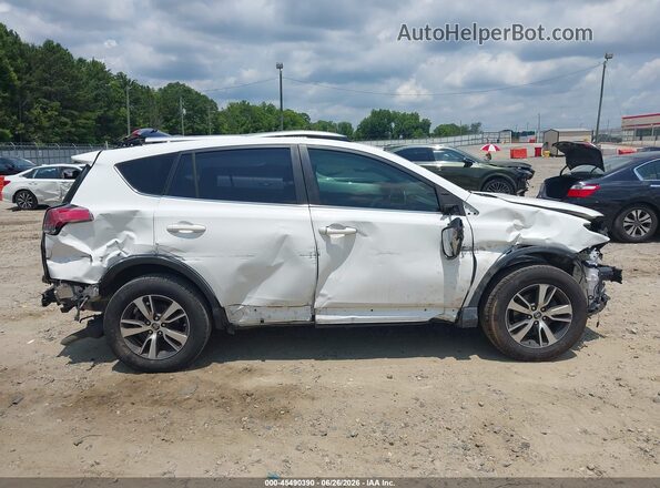 JTMWFREV4JJ201493 2018 TOYOTA RAV4 White Rear interior view
