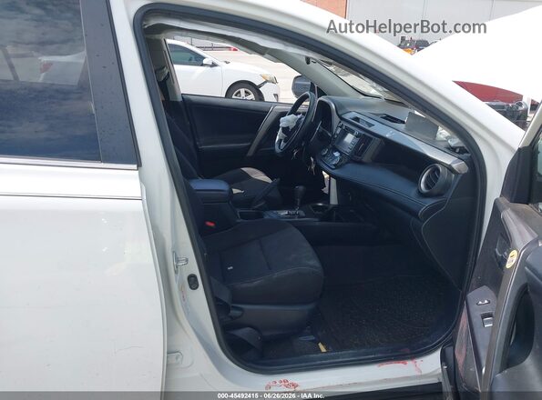 JTMWFREV4JJ728899 2018 TOYOTA RAV4 White Front interior view
