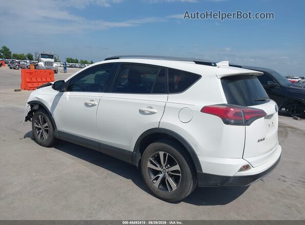 JTMWFREV4JJ728899 2018 TOYOTA RAV4 White Rear left