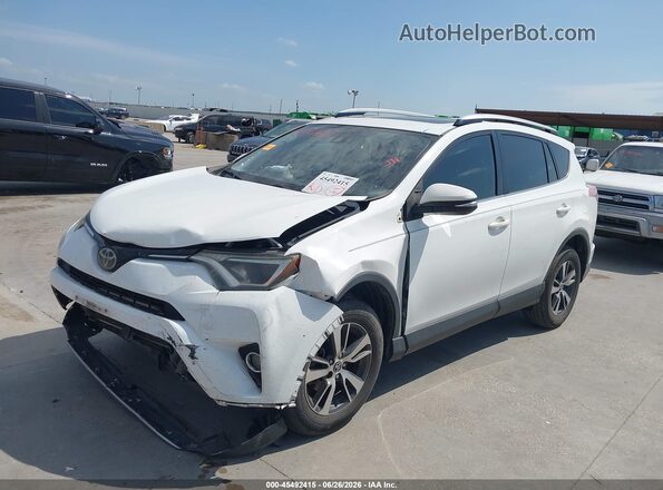 JTMWFREV4JJ728899 2018 TOYOTA RAV4 White Front left