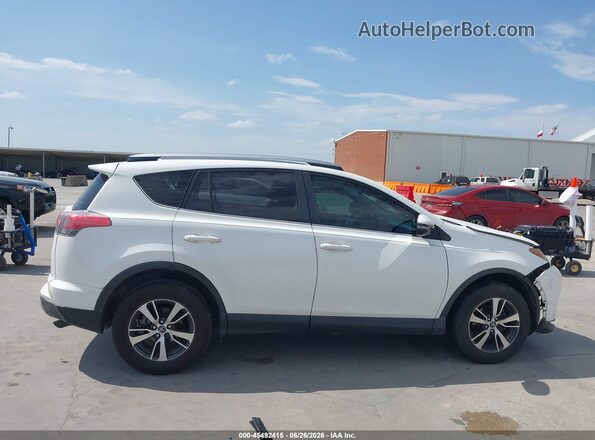 JTMWFREV4JJ728899 2018 TOYOTA RAV4 White Rear interior view