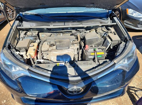 JTMWFREV5HD100617 2017 TOYOTA RAV4 Blue Vista interior trasera