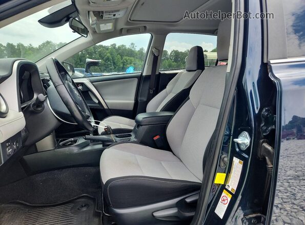 JTMWFREV5HJ133649 2017 TOYOTA RAV4 Blue Widok wnętrza z przodu