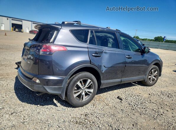 JTMWFREV5JD109811 2018 TOYOTA RAV4 Gray Trasero derecho