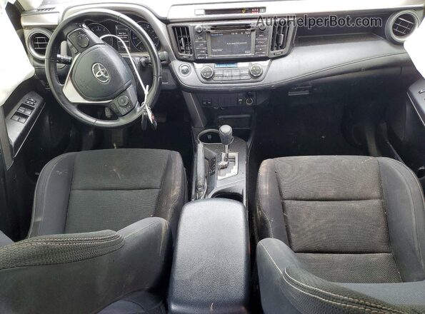 JTMWFREV5JD109811 2018 TOYOTA RAV4 Gray Vista del salpicadero