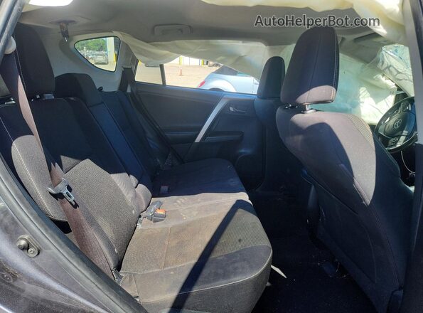 JTMWFREV5JD109811 2018 TOYOTA RAV4 Gray Vista de los asientos traseros