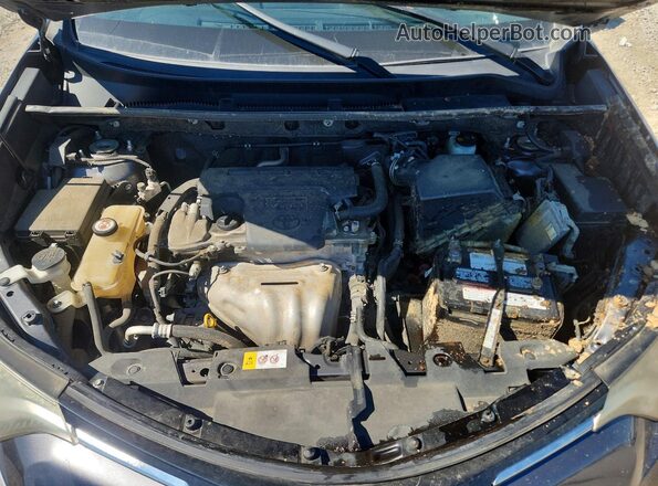JTMWFREV5JD109811 2018 TOYOTA RAV4 Gray Vista interior trasera