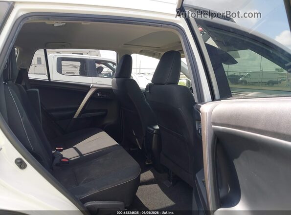 JTMWFREV5JJ193341 2018 TOYOTA RAV4 White Vista de la etiqueta del VIN