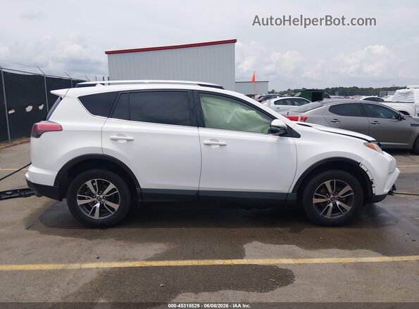 JTMWFREV5JJ202295 2018 TOYOTA RAV4 White Սալոնի հետևի տեսք