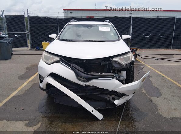 JTMWFREV5JJ202295 2018 TOYOTA RAV4 White Սարքավորումների վահանակի տեսք