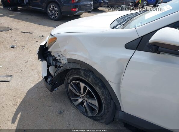 JTMWFREV6GJ089966 2016 TOYOTA RAV4 Белый Вид спереди