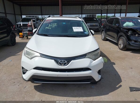 JTMWFREV6GJ089966 2016 TOYOTA RAV4 Белый Вид щитка приборов