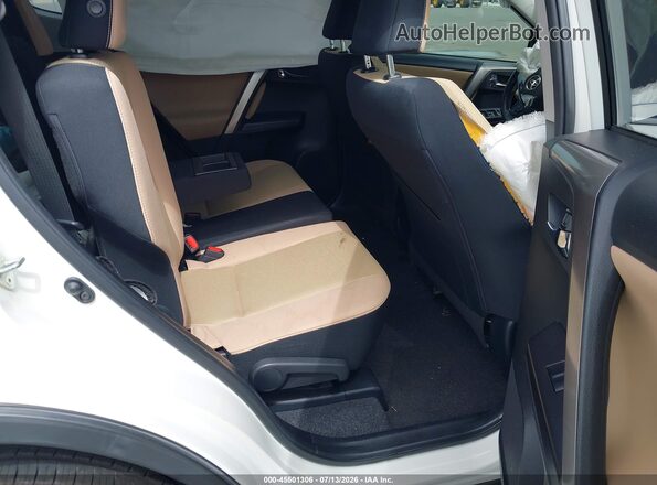 JTMWFREV6HJ104029 2017 TOYOTA RAV4 White VIN კოდის სტიკერის ხედი