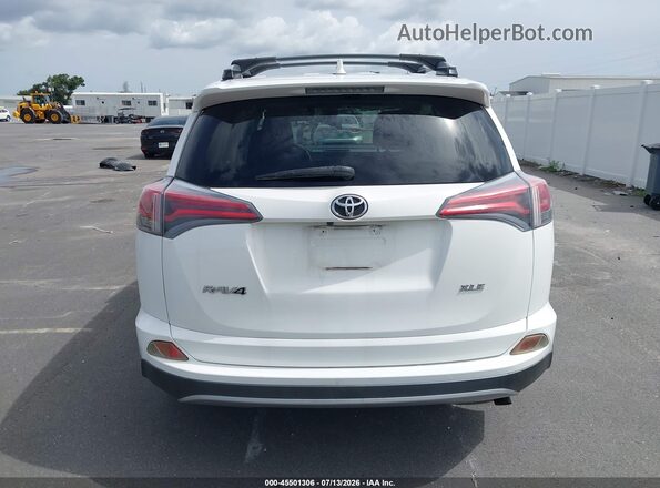 JTMWFREV6HJ104029 2017 TOYOTA RAV4 White 