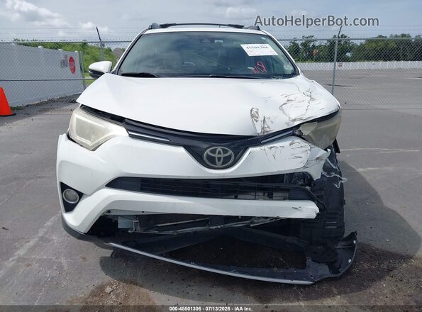 JTMWFREV6HJ104029 2017 TOYOTA RAV4 White ხელსაწყოთა პანელის ხედი