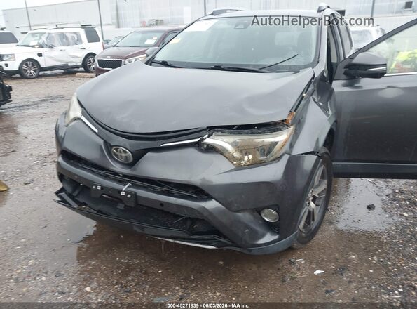 JTMWFREV6HJ149102 2017 TOYOTA RAV4 Gray Front view