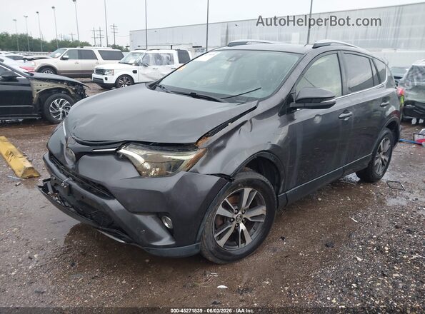 JTMWFREV6HJ149102 2017 TOYOTA RAV4 Gray Front left